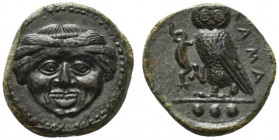Sicily, Kamarina, c. 420-410 BC. Æ Tetras (15mm, 3.33g, 6h). Gorgoneion. R/ Owl standing l., head facing, holding lizard in talon. CNS III, 21; SNG AN...