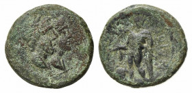 Sicily, Katane, late 3rd century BC. Æ (20.5mm, 4.93g, 12h). Jugate busts of Serapis and Isis; grain-ear behind. R/ Apollo standing slightly l., leani...