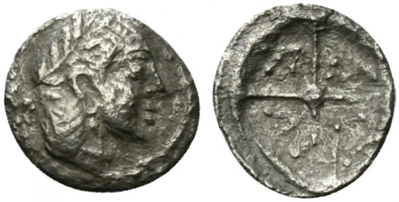 Sicily, Syracuse, c. 470 BC. AR Litra (10mm, 0.55g). Head of Arethusa r. R/ Whee...