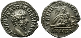 Lucius Verus (161-169). AR Denarius (18mm, 3.16g, 5h). Rome, AD 163. Bare head r. R/ Armenia seated l. on ground in attitude of mourning; shield and v...