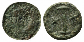 Justinian I (527-565). Æ 10 Nummi (16.5mm, 4.74g). Rome or Ravenna, 547-549. Helmeted and cuirassed facing bust, holding globus cruciger and shield. R...
