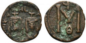 Michael II and Theophilus (820-829). Æ 40 Nummi (19mm, 3.35g, 6h). Syracuse, 821-9. Crowned facing busts of Michael and Theophilus. R/ Large M; cross ...
