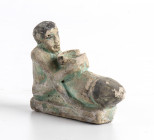 Egyptian Ptolemaic faience glazed ithyphallic figure; ca. 332 - 30 BC; the naked male figure is seated, with bend knees, he holds a cup based on his l...