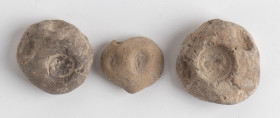 Lot of three Sasanian clay bullae; ca. 5th century AD; diam. max cm 4