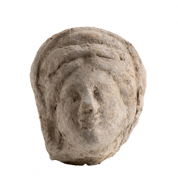 Roman terracotta head of a girl; ca. 3rd century BC; height ca. cm 7