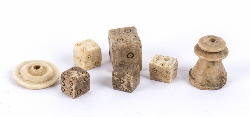 Group of 7 Roman Bone Dice and Checkers; ca. 1st - 3rd centuries AD; height max ...