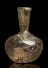 Byzantine Glass Unguentarium; ca. 5th - 6th centuries AD; height cm 11