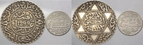 Marocco - Hassan I (1873-1894) - lotto di 2 monete da 1 dirham e 2½ dirhams 1299 AH (1882) - Ag 
mediamente BB 

Spedizione solo in Italia / Shippi...