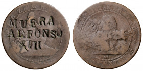 1870. Gobierno Provisional. Barcelona. OM. 10 céntimos. Contramarca política: MUERA/ALFONSO/XIII. 9,40 g. BC.