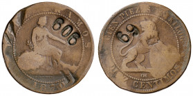 1870. Gobierno Provisional. Barcelona. OM. 10 céntimos. Contramarca particular: 909 en anverso y 69 en reverso. 9,54 g. BC.