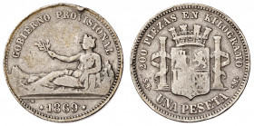 1869. Gobierno Provisional. SNM. 1 peseta. (Barrera 927). Falsa de época. 4,79 g. BC+.