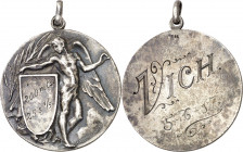 (1917). Vic. (Anverso similar a Cru.Medalles 1101, de Tarragona con Ø23 mm). Con anilla. Grabador: Vallmitjana. Plata. 11,11 g. Ø30 mm. MBC+.