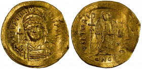 BYZANTINE EMPIRE: Justinian I, 527-565, AV solidus (4.35g), Constantinople, S-140, helmeted and cuirassed bust, holding globus cruciger & shield // an...