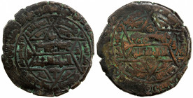 GREAT SELJUQ: Sanjar, 1118-1157, AE ornate fals (2.75g), Balkh, AH515, A-C1688, extremely complex arrangement with a center hexagram, with legends bot...