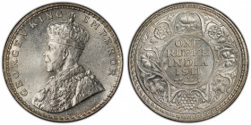 BRITISH INDIA: George V, 1910-1936, AR rupee, 1911(b), KM-523, S&W-8.15, with the so-called "pig"-style elephant, PCGS graded MS63. On the coin, the k...