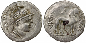 YUEH CHI: Sapadbizes, late 1st century BC, AR drachm (1.29g), Mitch-2824/28, helmeted bust right, floral design on the helmet, name behind // lion rig...