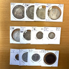 WORLDWIDE: LOT of 12 coins, including Bermuda: 1793 penny single pennant; Biafra: 1969 shilling KM-2 and 1969 2-1/2 shillings; and Bolivia: 1799 ¼ rea...