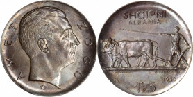 ALBANIA. 5 Franga Ari, 1926-R. Rome Mint. Zog I. NGC MS-63.

KM-8.1. Variety with star below head. A tremendous coin that yields a beautiful cartwhe...