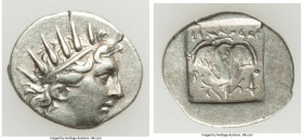 CARIAN ISLANDS. Rhodes. Ca. 88-84 BC. AR drachm (16mm, 2.08 gm, 11h). Choice VF. Plinthophoric standard, Menodorus, magistrate. Radiate head of Helios...