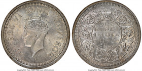 British India. George VI Rupee 1945-(B) MS63 NGC, Bombay mint, KM557.1. Pastel pink and blue toned. 

HID09801242017

© 2020 Heritage Auctions | A...