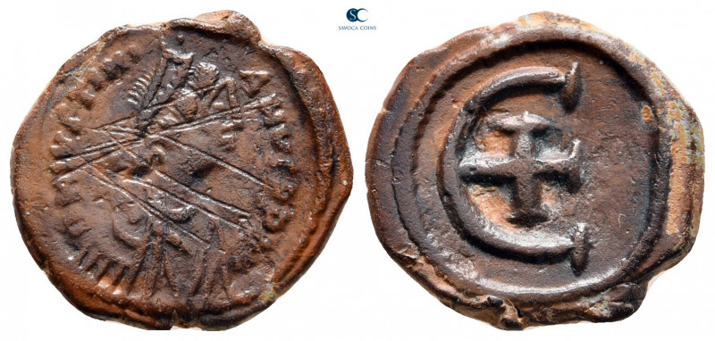 Justinian I AD 527-565. Theoupolis (Antioch)
Pentanummium Æ

16 mm, 2,63 g
...