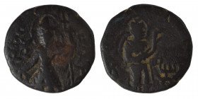 INDIA, Kushan Empire. Kanishka I, circa 127-152. Drachm (bronze, 4.26 g, 17 mm). ÞAO ΚANηρKI Kanishka I standing front, head to left, sacrificing with...