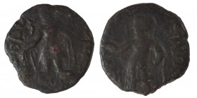 INDIA, Kushan Empire. Kanishka I, circa 127-152. Drachm (bronze, 3.74 g, 17 mm). ÞAO ΚANηρKI Kanishka standing left, holding goad and standard, sacrif...