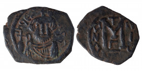 ISLAMIC. Time of the Rashidun. Pseudo-Byzantine types. Fals (bronze, 4.81 g, 27 mm), imitating a follis of Constans II, uncertain mint, circa 24/5-26/...