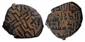 MENKUJAKIDS. Sulayman b. Ishaq, 1181. Fals (bronze, 2.79 g, 19 mm). Islamic legend, citing the Khaqanid ruler Akhsatan I. Rev. Ornamental cross , with...