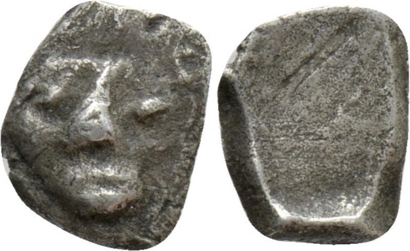 GAUL. Massalia. Hemiobol (Circa 500-475 BC). 

Obv: Facing head.
Rev: Incuse ...