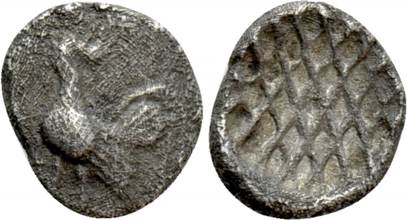 TROAS. Dardanos. Obol (450-420 BC). 

Obv: Cock standing left.
Rev: Cross-hat...