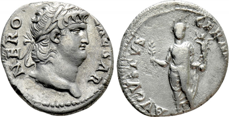 NERO (54-68). Denarius. Rome. 

Obv: NERO CAESAR. 
Laureate head right.
Rev:...