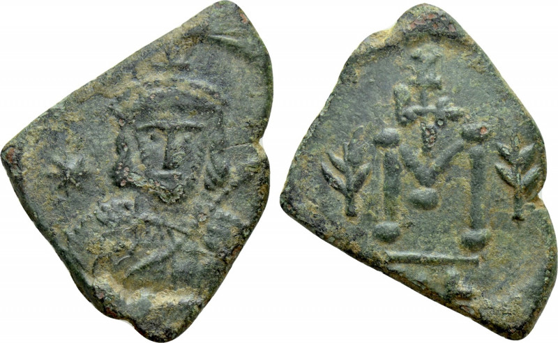 TIBERIUS III APSIMAR (698-705). Follis. Syracuse. 

Obv: Crowned, draped and c...