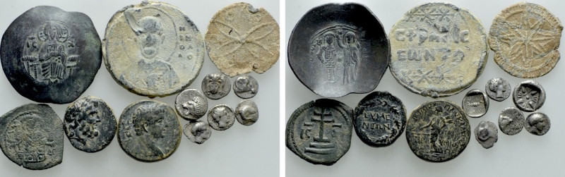 12 Ancient Coins, Seals and Tokens. 

Obv: .
Rev: .

. 

Condition: See p...