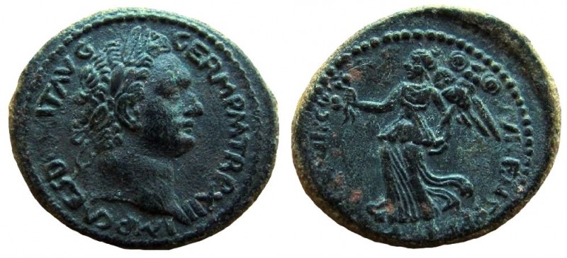 Judaea. Caesarea Maritima. Domitian, 81-96 A.D. AE 24 mm. Judaea Capta issue.
...