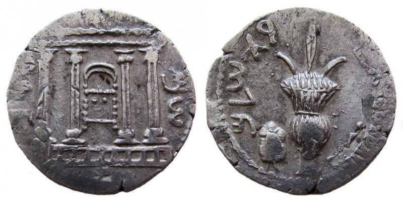 Judaea. Bar Kochba Revolt, 132-135 AD. AR Sela. 24 mm.

Struck on Tetradrachm ...