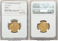 Holland. Provincial gold Ducat 1752 AU50 NGC, KM12.3. A moderately circulated representative with well-struck devices and presenting antique gold toni...