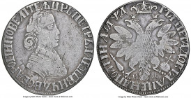 Peter I Poltina (1/2 Rouble) 1704-MД Fine Details (Obverse Damage) NGC, Kadashevsky mint, KM106.2. A seldom-seen issue regardless of condition, bearin...