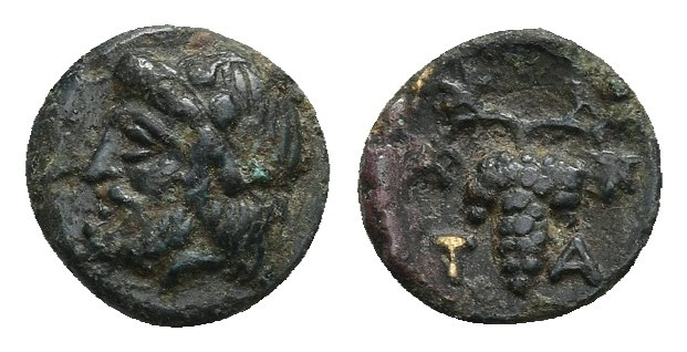 AEOLIS. Temnos. Ae (3rd century BC).
Obv: Head of Dionysos left, wearing ivy wr...