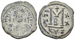 JUSTINIAN I (527-565). Follis. Cyzicus. Dated RY 21 (547/8). Obv: D N VSTINIANVS (sic) P P AVG (P's retrograde). Helmeted and cuirassed bust facing, h...