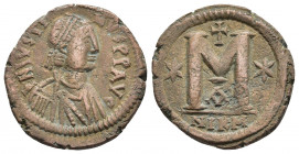 JUSTIN I (518-527). Follis. Nicomedia.
Obv: D N IVSTINVS P P AVG.
Diademed, draped and cuirassed bust right.
Rev: Large M; star to left and right, ...