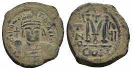 MAURICE TIBERIUS (582-602). Follis. Constantinople. Dated RY 7 (588/9).
Obv: D N MAVRIC TIЬЄR P P AVG.
Helmeted and cuirassed bust facing, holding g...