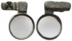 A Roman key and a ring with engraved bezel; bronze; ca. 3rd century AD; length key.
.
Condition: See picture.
Weight: 17.56 g.
Diameter: 31 mm.