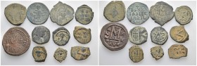 11 Byzantine Coins.

Obv: .
Rev: .

.

Condition: See picture. No return.

Weight: g.
Diameter: mm.