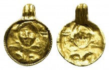 Late Roman or Byzantine. Ca. 4th-6th centuries A.D.. Gold pendant. A large repousse male bust, probably imperial, head in high relief. Small bezel set...