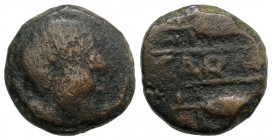 Spain, Carmo, c. 1st century BC. Æ As (22mm, 10.69g, 9h). Male head r. R/ Ethnic between two grain ears r. CNH 24. Brown patina, Fine / Good Fine