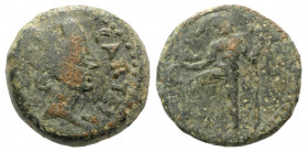 Spain, Carteia, after 44 BC. Æ Semis (21mm, 7.64g, 6h). Turreted head of Tyche r. R/ Neptune standing l., holding dolphin and trident. RPC I 122; CNH ...