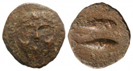 Spain, Gadir (Gades), c. 235-200 BC. Æ Half Unit (21mm, 3.00g, 12h). Head of Melqart (Herakles) facing, wearing lion skin. R/ Two tunnies l. CNH 24-6....