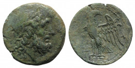 Bruttium, The Brettii, c. 211-208 BC. Æ Unit (22mm, 7.24g, 3h). Laureate head of Zeus r.; dagger to l. R/ Eagle standing l., head r., with wings sprea...