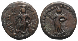 India, Yaudheyas, c. 3rd-4th century AD. Æ (24mm, 11.36g, 12h). Karttikeya standing facing, holding spear and resting hand on hip; peacock standing l....